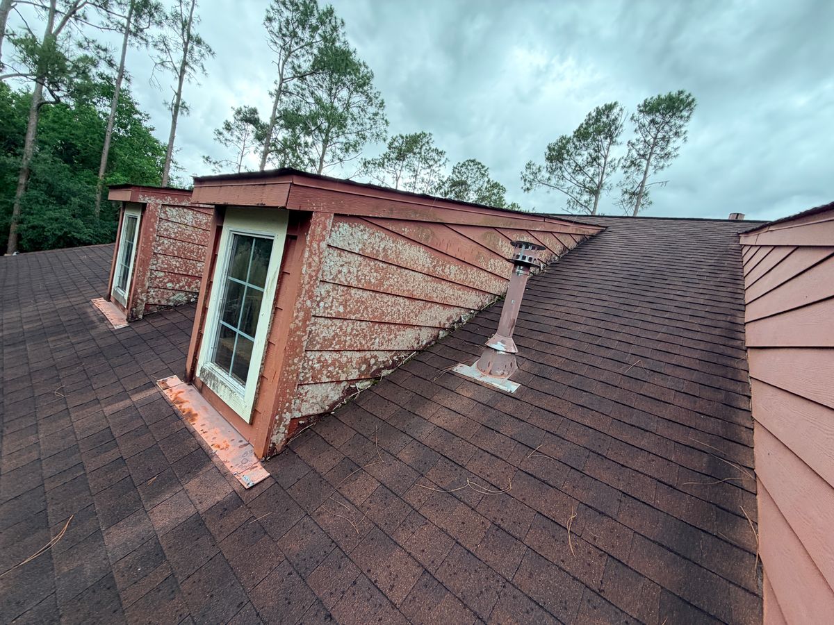 Before: dormer with peeling, weathered siding and trim