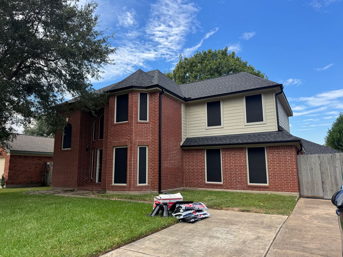 After: same Pasadena home with a new Rustic Black TAMKO Heritage roof