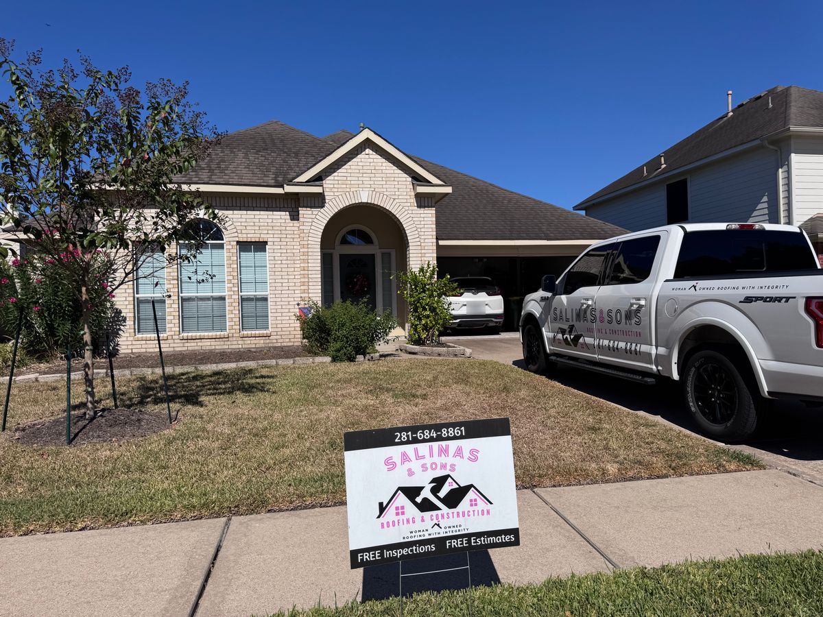 Before: one-story brick home in Pearland with a worn brown shingle roof