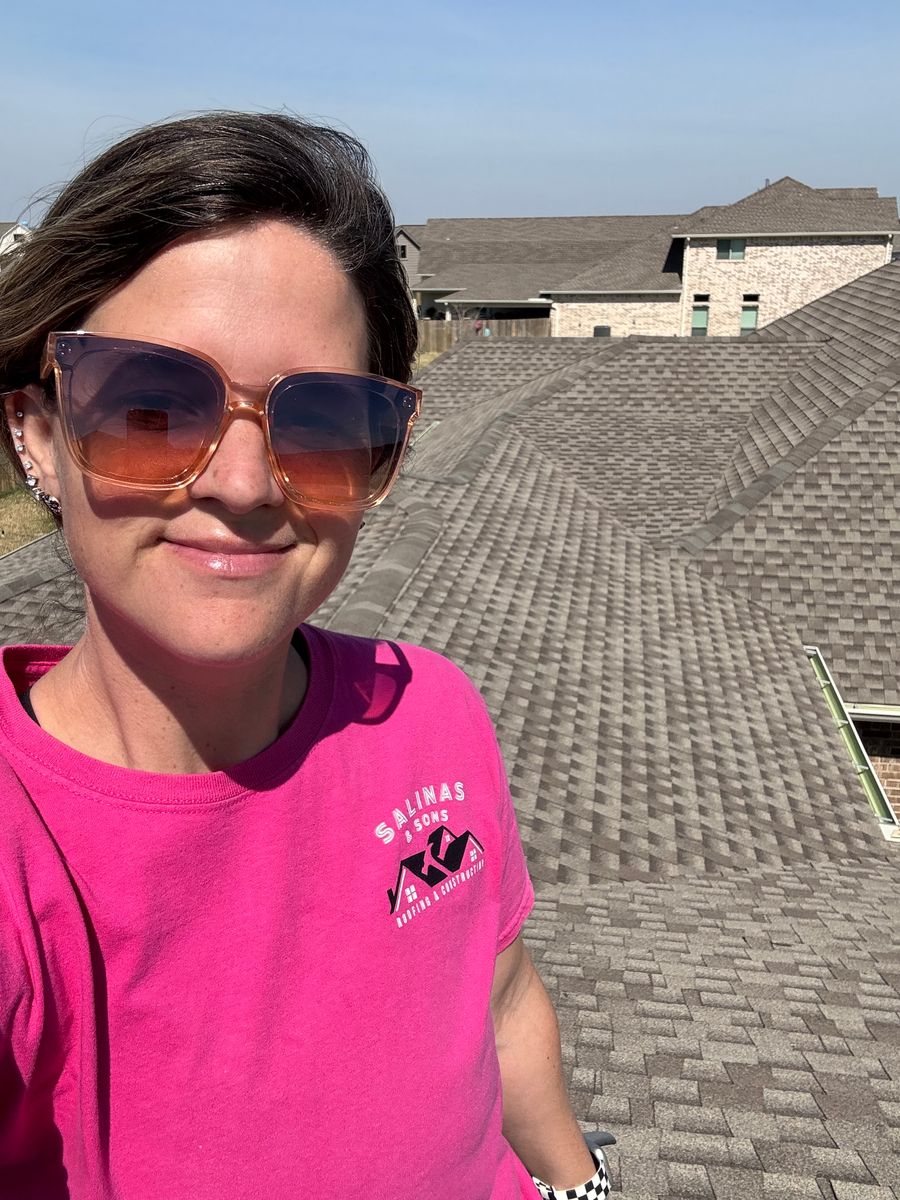 Jess Salinas on a client's roof
