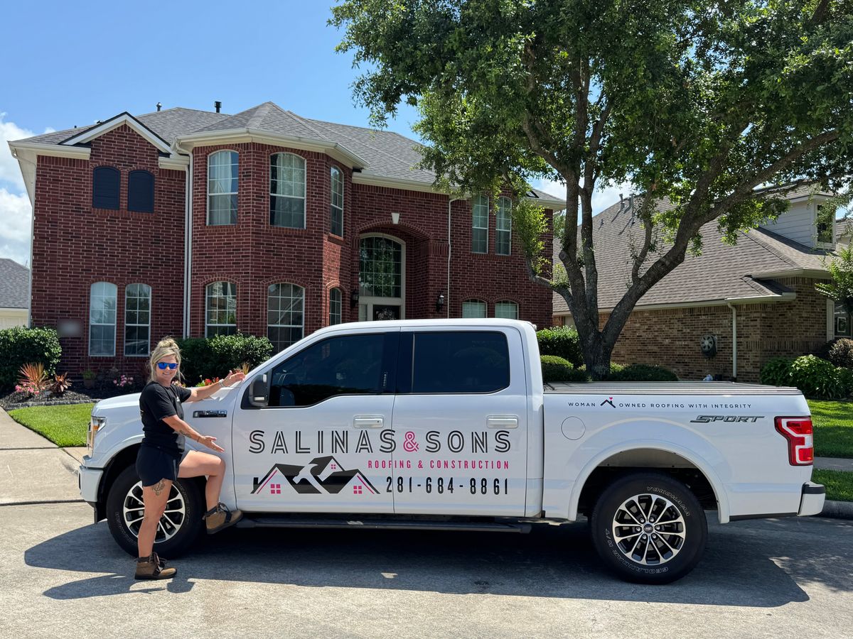 Jess Salinas with the Salinas and Sons work truck
